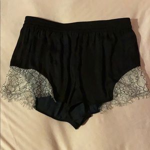 Black shorts with lace details